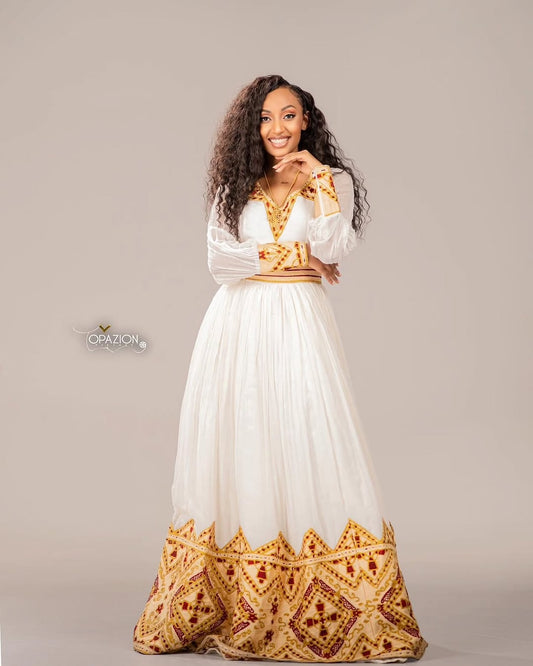 Gold Ethiopian Dress – Luxurious Traditional Habesha Outfit with Subtle Woven Details for Weddings and Special Occasions