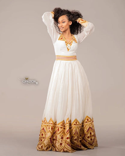 Gold Ethiopian Dress – Luxurious Traditional Habesha Outfit with Subtle Woven Details for Weddings and Special Occasions