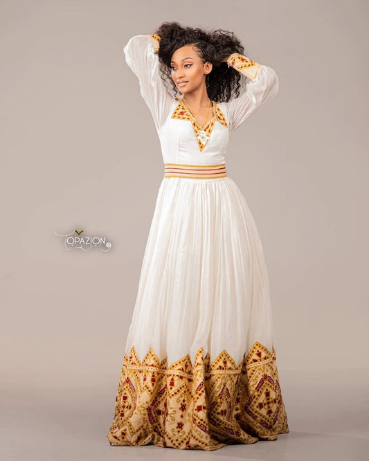 Gold Ethiopian Dress – Luxurious Traditional Habesha Outfit with Subtle Woven Details for Weddings and Special Occasions