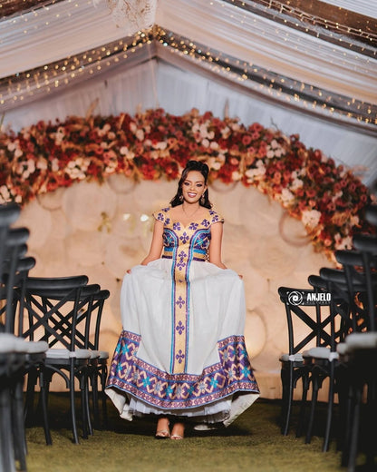 Purple Ethiopian Traditional Dress – Elegant Habesha Outfit with Graceful Design for Weddings and Cultural Events