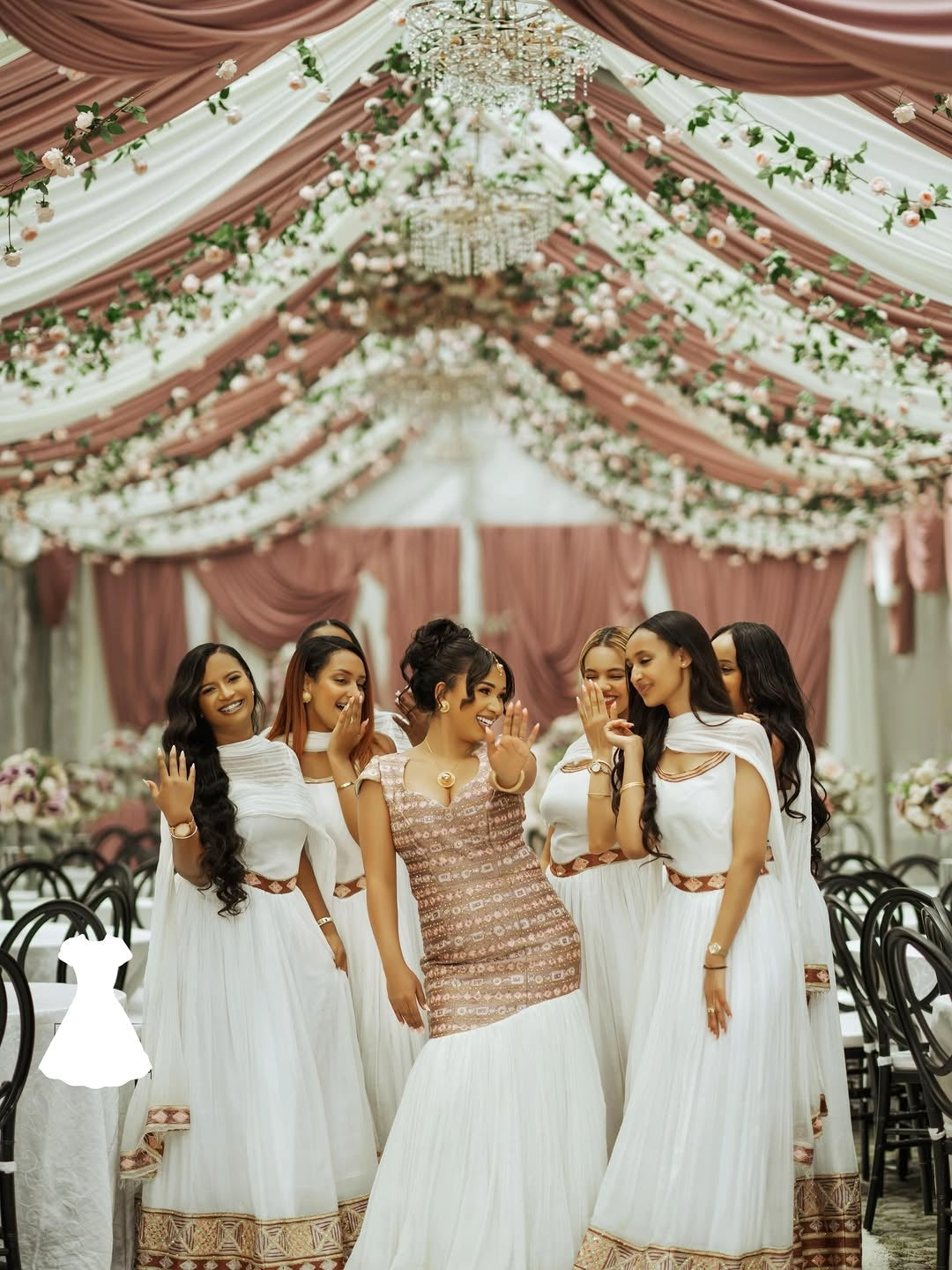 Group of women in  Habesha Wedding Dress with formal attire at a decorated event