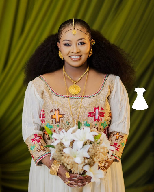 Woman in Ethiopian Wedding Dress holding flowers against a green curtain background