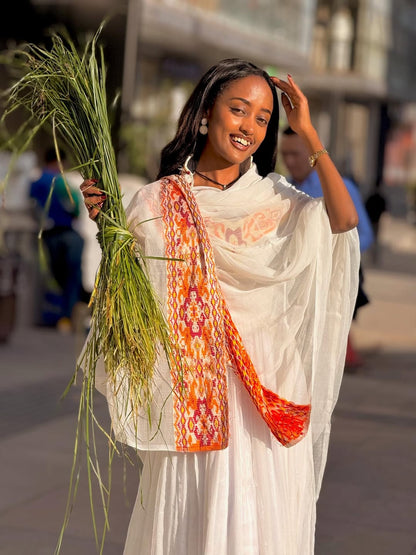 Orange Habesha Dress – Modern Ethiopian Traditional Outfit with Graceful Fit for Celebrations and Cultural Gatherings