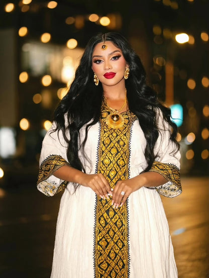 Gold Habesha Zuria – Elegant Ethiopian Traditional Dress with Intricate Tilf for Weddings, Cultural Ceremonies, and Special Occasions