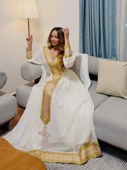 Yellow Habesha dress for graduation day with a bright color and traditional embroidery