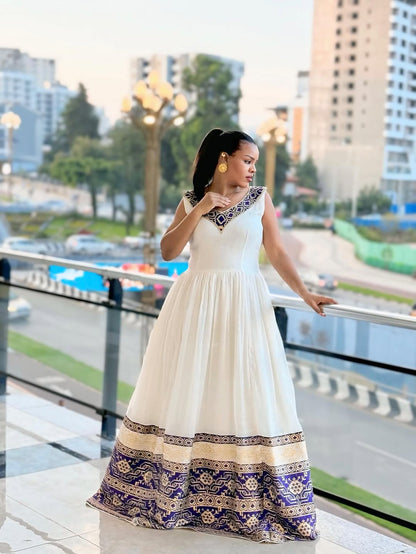 Modern Eritrean Dress: Deep Purple Cotton with Bold Embroidery borders