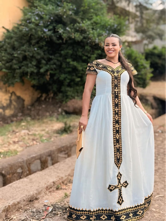 White and Gold Habesha Dress – Handcrafted Ethiopian Outfit for Weddings & Church