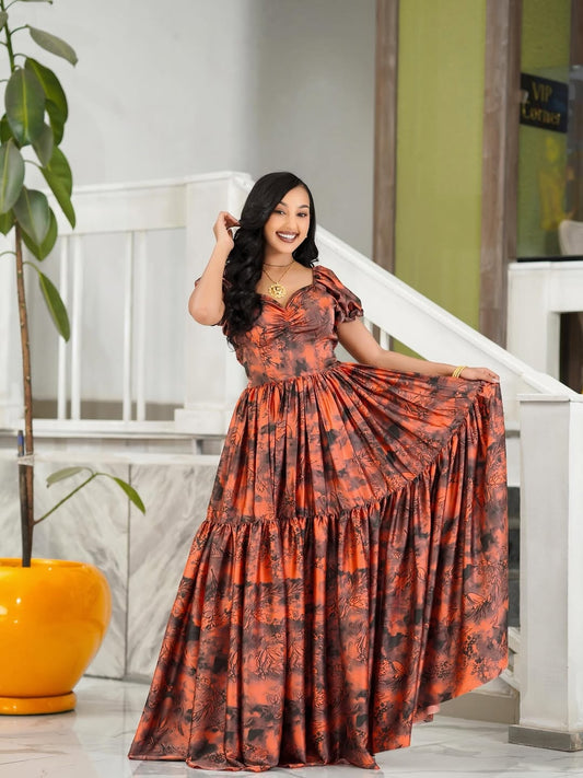 Orange Chiffon Habesha Dress – Flowing Ethiopian dress with Elegant Hand-Embroidered Details for Weddings & Cultural Celebrations