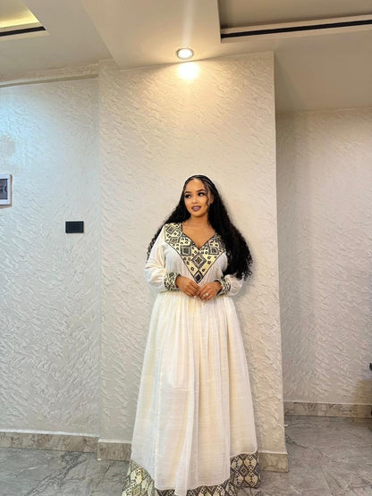 Ethiopian Dress – Modern White Cotton with silver Embroidery for Cultural Festivals