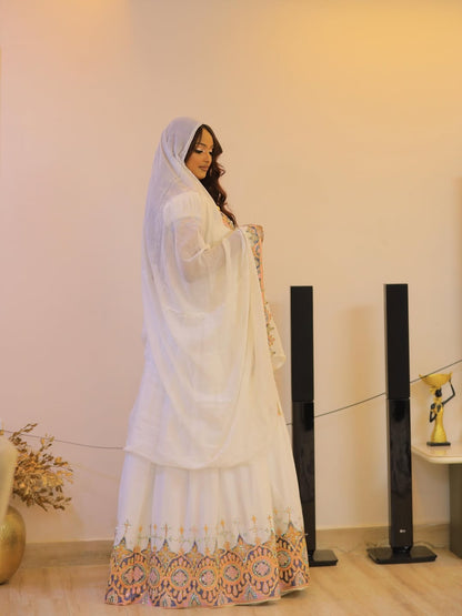 White Habesha Kemis in Handwoven Shemma – Multicolor Geometric Tilf Ethiopian Traditional Dress for Genna & Cultural Events