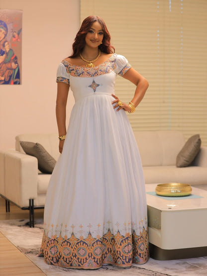 White Habesha Kemis in Handwoven Shemma – Multicolor Geometric Tilf Ethiopian Traditional Dress for Genna & Cultural Events